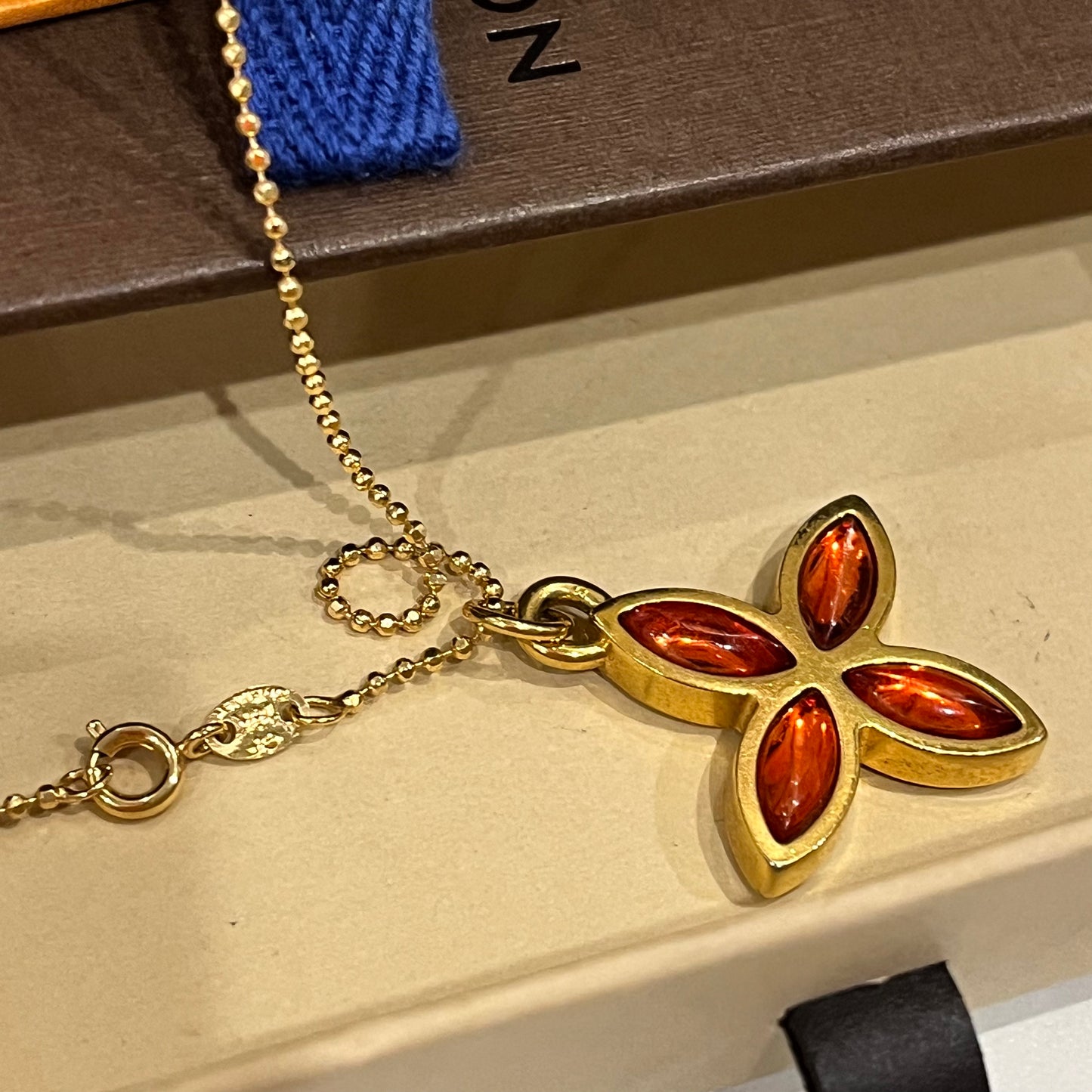 Pointed Flower / Amber Orange Crystal Logo 2- Sided Louis Vuitton Charm on Necklace