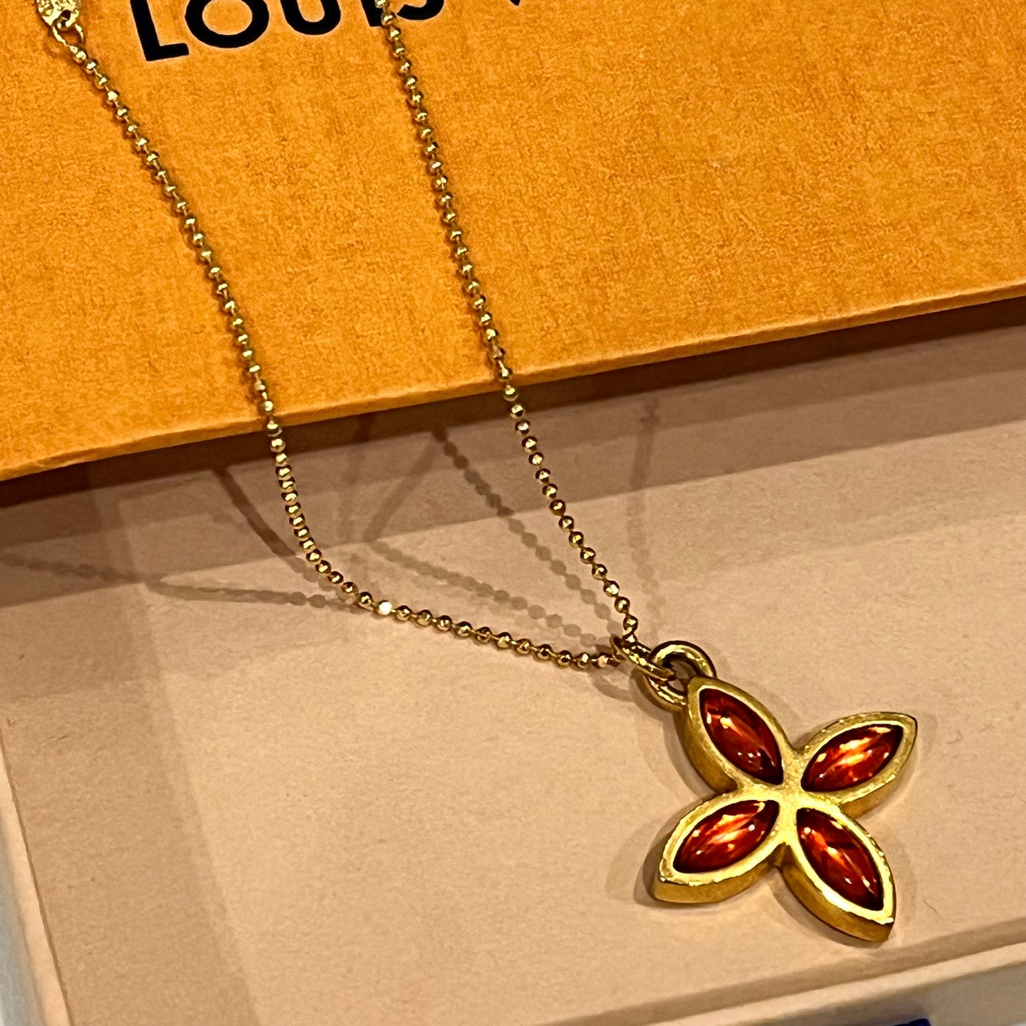 Pointed Flower / Amber Orange Crystal Logo 2- Sided Louis Vuitton Charm on Necklace
