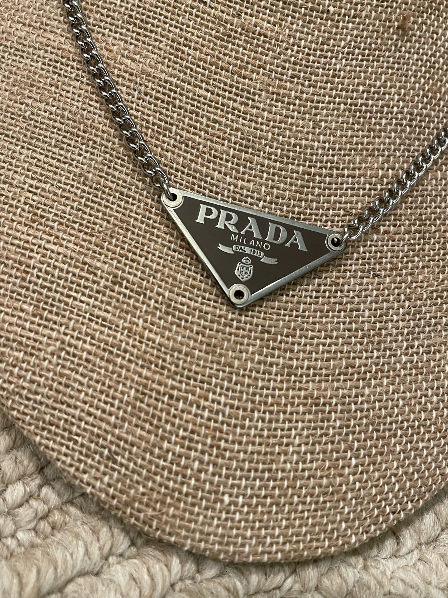 Prada Triangle Plate Charms on Necklaces